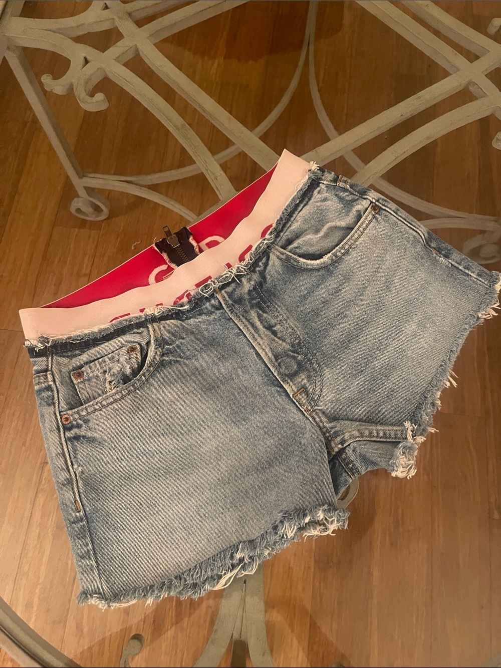 GRLFRND  Light Blue Distressed Denim Shorts with Peek  Waistband